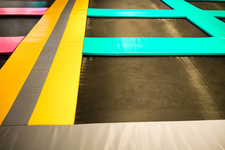 Interconnected trampolines for indoor jumping. New revolution playground and fun activity for all ages.の写真素材