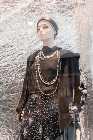 Chanel shop at Emquatier, Bangkok, Thailand, Sep 7, 2017 : Luxury and fashionable brand window display. New Fall collection of black and white clothings and accessories showcase at flagship store. Closed up view.のeditorial素材