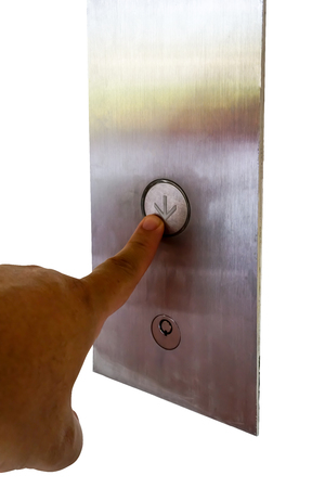 Finger presses the elevator button. Man hand reaches for the button of the elevator call.