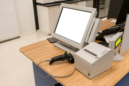 desktop computer, and bar code scanner for financial business in shopping storeの写真素材