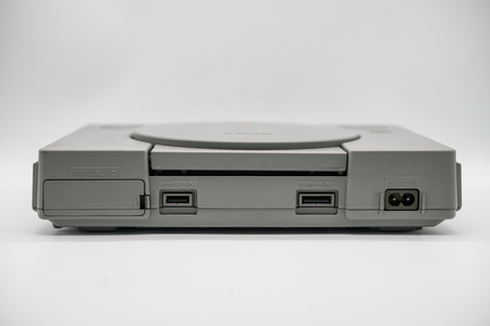Bangkok, Thailand - Dec 20, 2017: Vintage PlayStation console by Sony Entertainment. Illustrative,...