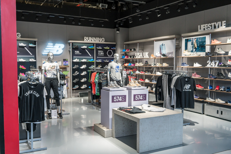 New Balance shop at Mega Bangna, Bangkok, Thailand, Oct 18, 2017 : Trendy and fashionable brand of sportswear showroom with modern interior shop design.のeditorial素材