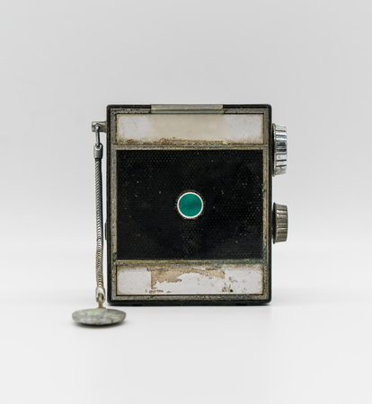 Pocket vintage radio isolated on white background