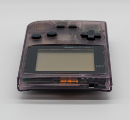 Bangkok, Thailand - Jan 18, 2018: Purple Game Boy Pocket, Vintage portable game by Nintendo. Illustrative, editorial.のeditorial素材