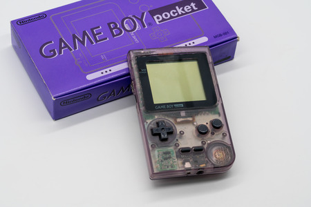 Bangkok, Thailand - Jan 18, 2018: Purple Game Boy Pocket, Vintage portable game by Nintendo. Illustrative, editorial.のeditorial素材