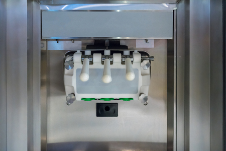 floor metal commercial soft serve ice cream frozen yogurt machine. restaurant supplyの写真素材