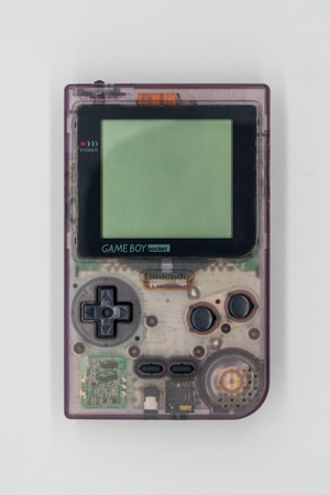 Bangkok, Thailand - Jan 18, 2018: Purple Game Boy Pocket, Vintage portable game by Nintendo. Illustrative, editorial.のeditorial素材