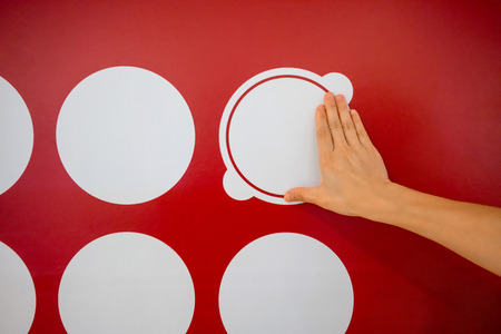 Woman using hands with dot graphic on red wall. Business info graphic interface design concept.の写真素材