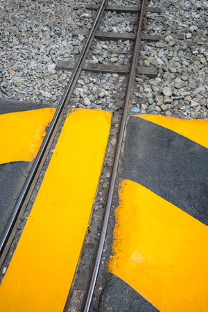 Industrial striped road or step warning railway. yellow-black pattern.の写真素材