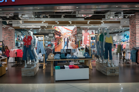 Cotton On shop at Mega Bangna, Bangkok, Thailand, Mar 19, 2018 : Fashionable clothing brand of casual clothings display and interior from entrance view.のeditorial素材