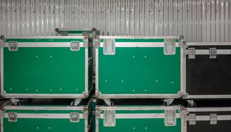 Set of green and black aluminium wooden flight cases. Musical instrument cases.の写真素材