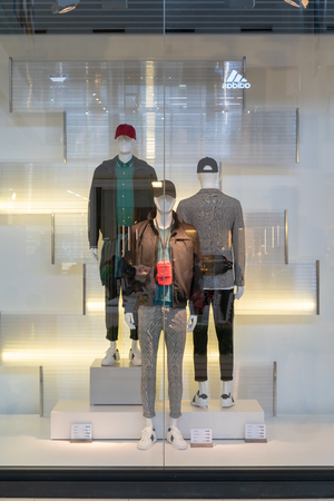 Zara Men's shop at Emquatier, Bangkok, Thailand, Apr 1, 2018 : Fashionable brand window display. Casual men clothings and accessories showcase in modern style.のeditorial素材
