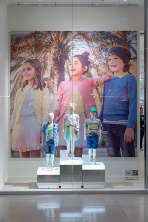 OVS shop at Mega Bangna, Bangkok, Thailand, Apr 1, 2018 : Fashionable kids clothing brand window display in front of the shop.のeditorial素材
