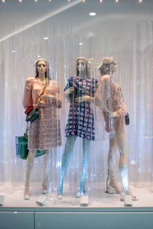 Chanel shop at Emquatier, Bangkok, Thailand, Apr 14, 2018 : Luxury and fashionable brand window display. Trendy collection clothings and accessories in clear curtain showcase at flagship store.のeditorial素材