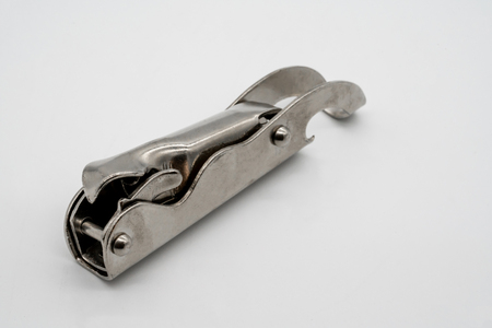 Vintage bottle opener isolated on white backgroundの写真素材