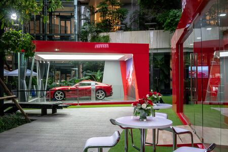 Ferrari Showroom at Emquatier, Bangkok, Thailand, July 20, 2018 : Luxury car temporary outdoor showroom window display in department storeのeditorial素材