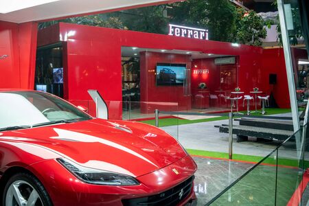 Ferrari Showroom at Emquatier, Bangkok, Thailand, July 20, 2018 : Luxury car temporary outdoor showroom window display in department storeのeditorial素材