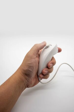 Bangkok, Thailand - Aug 19, 2018 : Wii, the home video game controller produced by Nintendo, isolated on white background.のeditorial素材