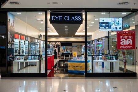 Eye Class shop at Central Westgate Bangkok, Thailand, May 10, 2018 : Optical shop interior with variety fashionable brand of  glasses and sunglasses display.のeditorial素材