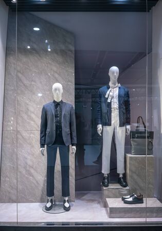 COS shop at Emquatier, Bangkok, Thailand, Oct 15, 2018 : Fashionable men clothing brand window display. Model showcase in modern style in front of the store.のeditorial素材