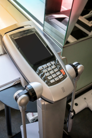 Digital machine uses bio-electrical impedance to give you a complete picture of your body composition such as weight, lean body mass, fat mass, body water.の写真素材