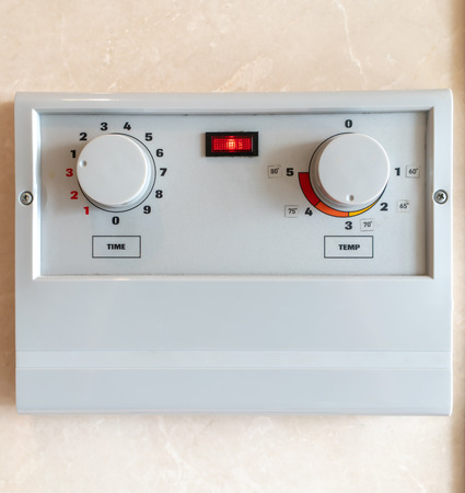 Air condition controller switch on white marble backgroundの写真素材