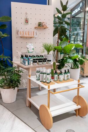 Ryn shop, Emquatier, Bangkok, Thailand, Feb 3, 2019  : Modern nature aromatherapy display with product in wooden cart.のeditorial素材