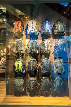 Superdry shop at Emquatier, Bangkok, Thailand, Apr 25, 2019 : Luxury and fashionable brand window display. New collection of bags showcase.のeditorial素材