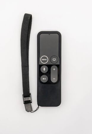 Apple TV remote : Bangkok, Thailand-  May 30, 2019:  Apple TV remote 4k with black silicone case isolated on white background.のeditorial素材