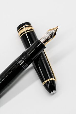 Montblanc Meisterstuck. Bangkok, Thailand - July 13, 2019 : Montblanc fountain pen isolated on white background.のeditorial素材