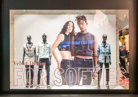 Diesel shop at Emquartier, Bangkok, Thailand, Oct 20, 2019 : Luxury and fashionable brand window display. New collection of casual clothings and bags.のeditorial素材