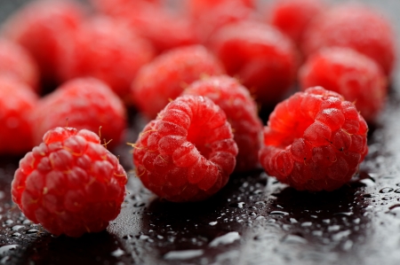 Closeup of fresh raspberries after rainの写真素材