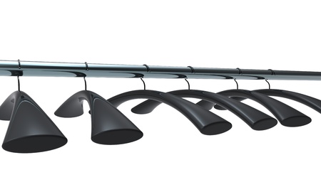 Black hangers on a metal bar.の写真素材