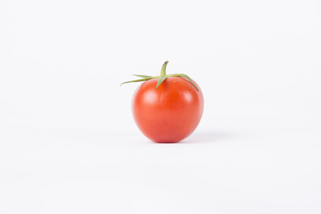 Tomato isolated on white backgroundの写真素材