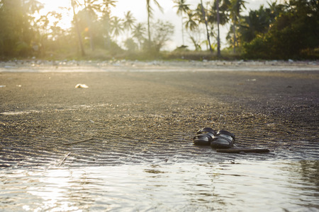 sandals on a beachの写真素材
