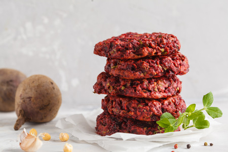 Beetroot vegan burgers with chickpea and herbs. Healthy vegetarian food concept.の写真素材