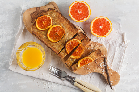 Healthy homemade orange cake with coconut. Healthy vegan food concept.の写真素材