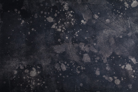 Black background with splashes and scratches. Copy space.の写真素材