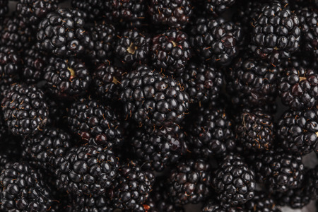 Fresh raw blackberry background, top view. Clean eating concept.