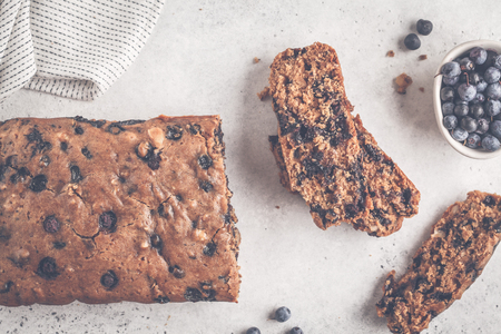 Vegan blueberry bread (cake). White background, top view. Healthy vegan dessert concept.の写真素材