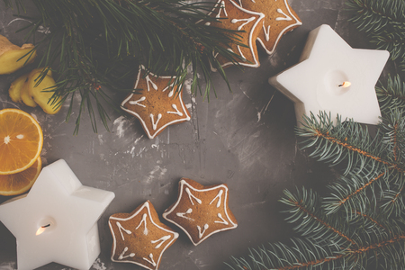 Traditional Christmas gingerbread star on a gray background.の写真素材