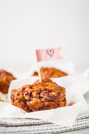 Vegan berry muffins on a white background, Valentine's Day food.の写真素材