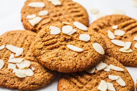 Homemade almond cookies on a white background. Healthy vegan dessert concept.
