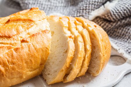 Sliced wheat bread on the board.