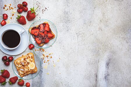 Breakfast toasts with coffee on the table, copy space.の写真素材