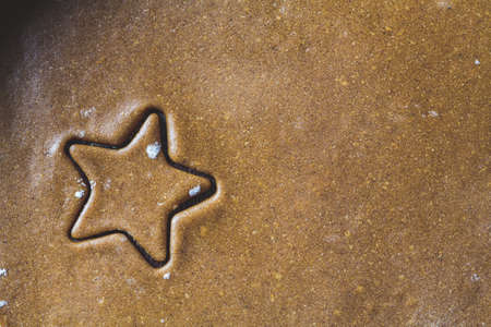 Christmas cooking concept. Raw gingerbread cookie, top view, copy space.の写真素材