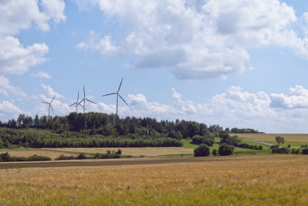  Bavaria, Germany. Field, sky and wind turbines.