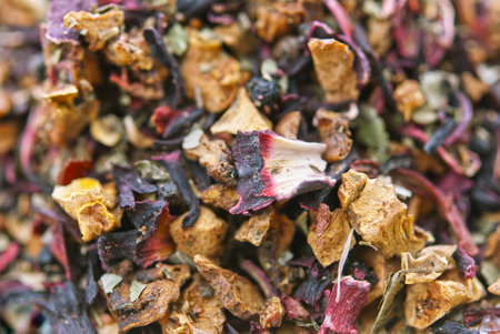 Close up of dry red tea, cranberry and appleの写真素材