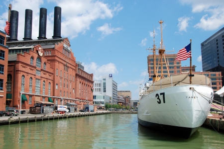 Hard Rock Cafe Power Plant and USCGC Taney Coast guard ship in Maritime museum in Baltimore Inner Harbor のeditorial素材