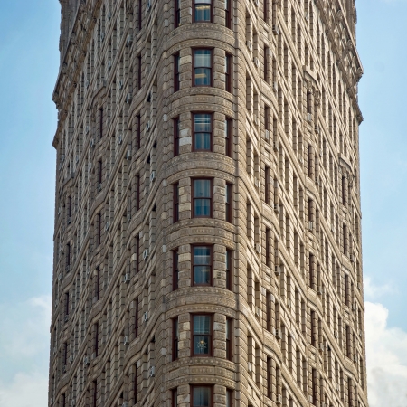 NEW YORK - CIRCA JULY 2009: The Flatiron Building circa July 2009 in New York City, USA. Flatiron building is considered to be one of the first skyscrapers ever built.のeditorial素材